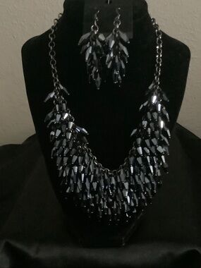 Statement Navy blue iridescent with matching drop crystal earrings.